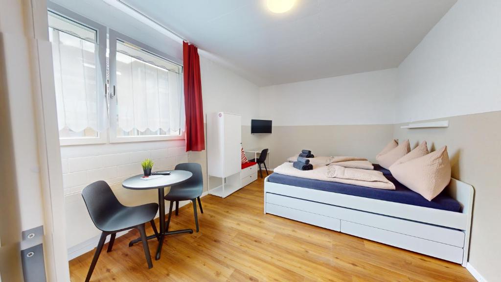 Posezení v ubytování Anstatthotel Cham - self-check-in