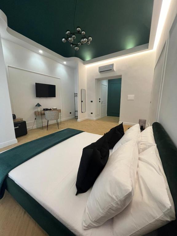 Postel nebo postele na pokoji v ubytování Miglio 43