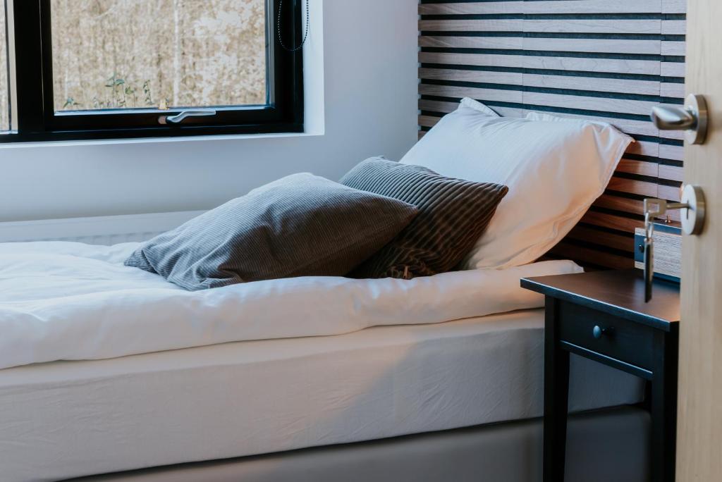 Voodi või voodid majutusasutuse Fellskotshestar Guesthouse toas