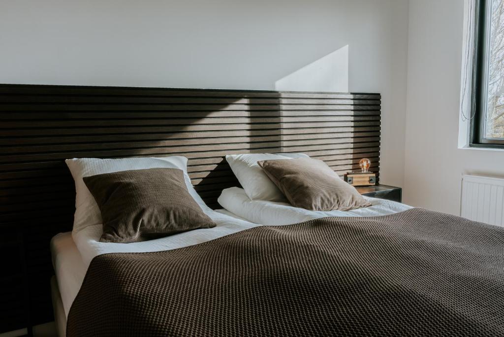 Voodi või voodid majutusasutuse Fellskotshestar Guesthouse toas