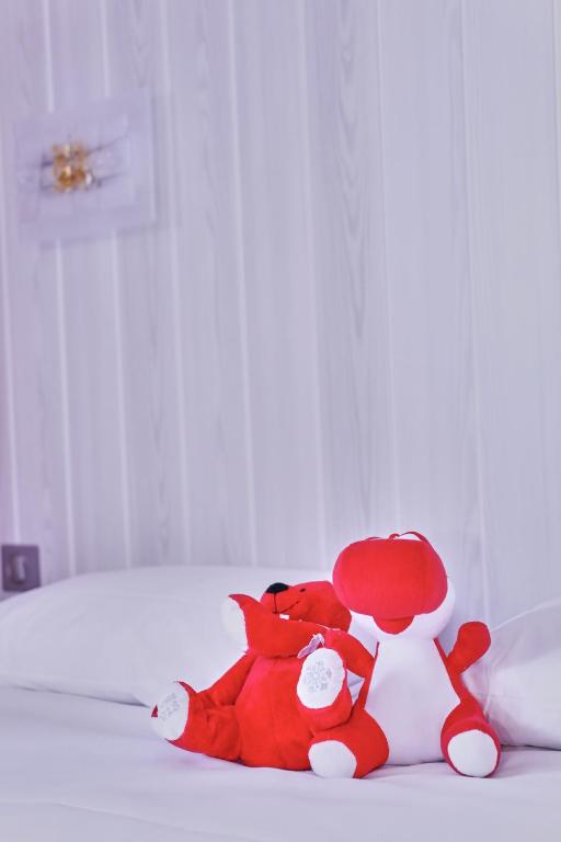 Postel nebo postele na pokoji v ubytování Brit Hotel Chambery