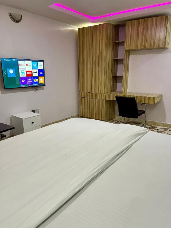 TV a/nebo společenská místnost v ubytování Weena Hotel & Resort