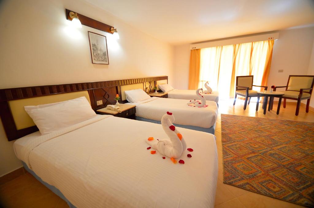Falcon Naama Star Hotel - Premium Triple Room , Pool View & Balcony