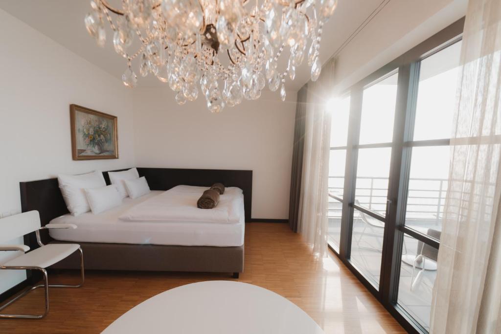 Postel nebo postele na pokoji v ubytování Boutique-Hotel maison 41 - Adults Only