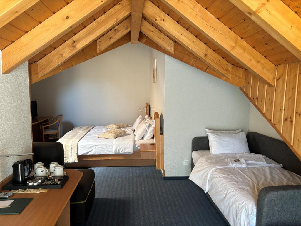 Postel nebo postele na pokoji v ubytování Hotel Bessunger Forst