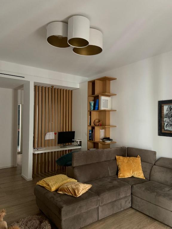 a living room with a couch and a desk at Il filo di Arianna in Putignano