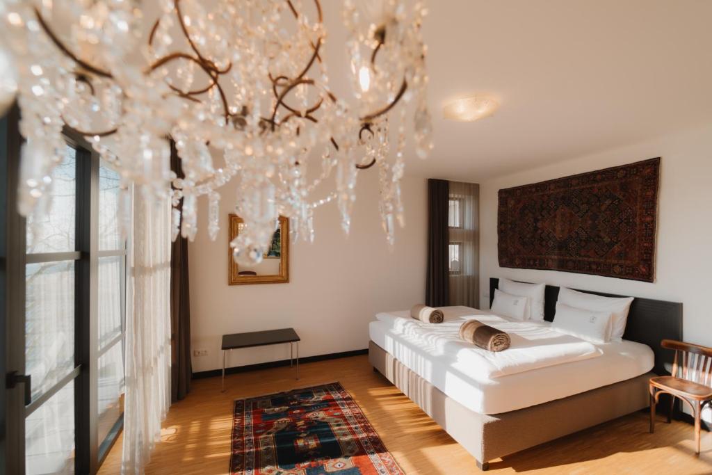 Postel nebo postele na pokoji v ubytování Boutique-Hotel maison 41 - Adults Only