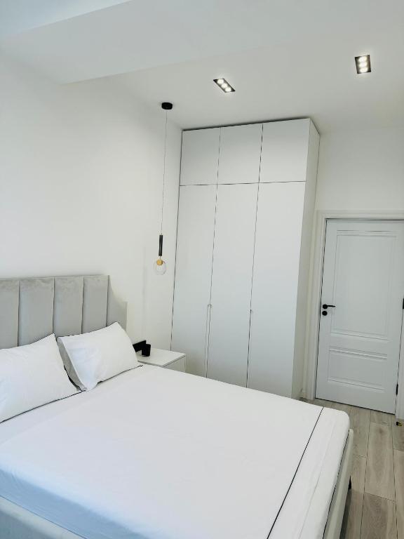 تصویر اتاق‌های White New Appartment - تصویر ۲