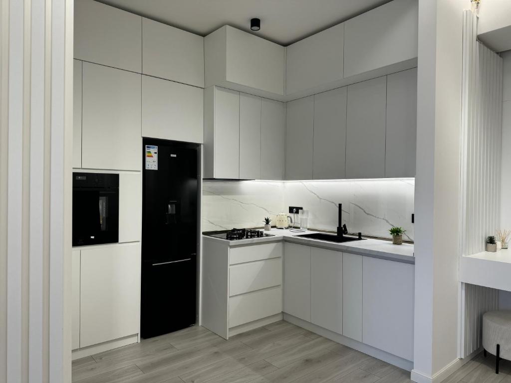 لابی و فضای عمومی White New Appartment - تصویر ۵