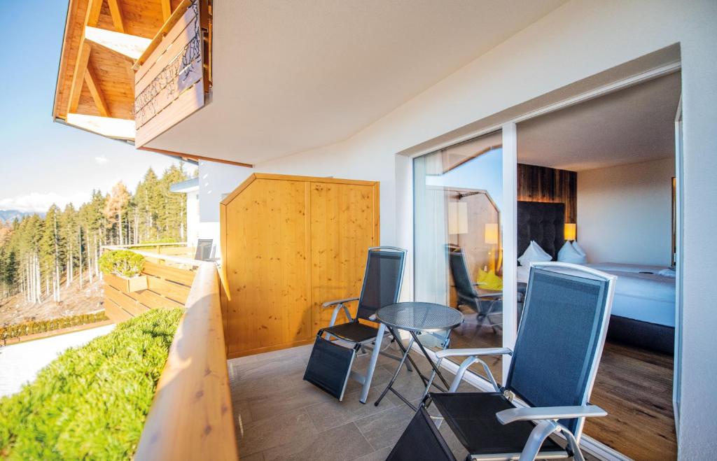 Posezení v ubytování Hotel DAS ROYAL in Obereggen