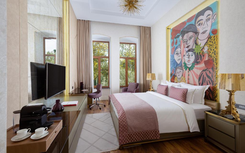 TV a/nebo společenská místnost v ubytování ART Gallery Hotel