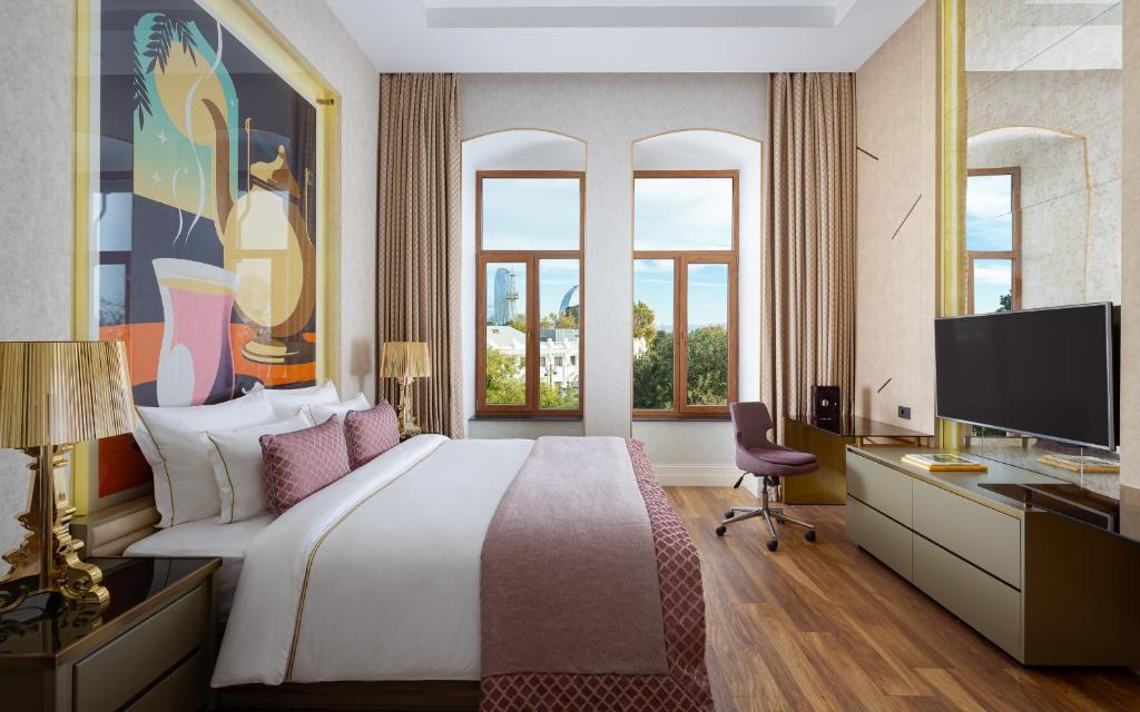 TV a/nebo společenská místnost v ubytování ART Gallery Hotel