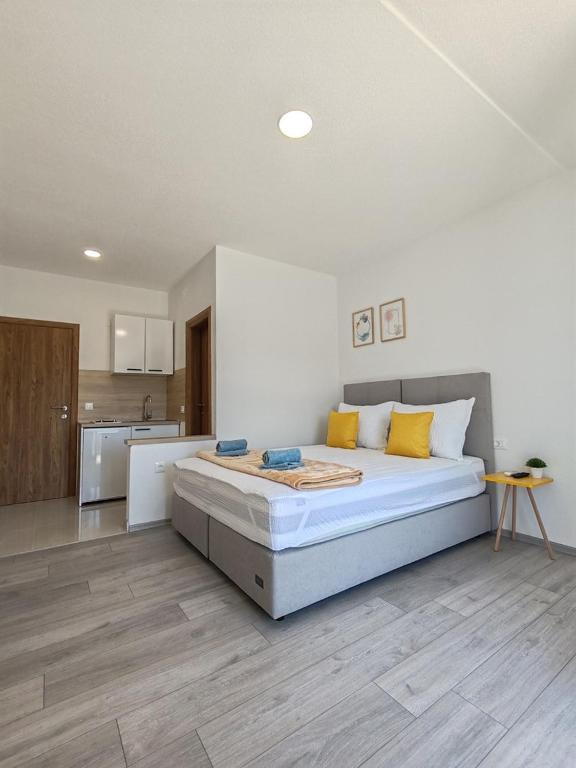 Postel nebo postele na pokoji v ubytování Apartments Kata