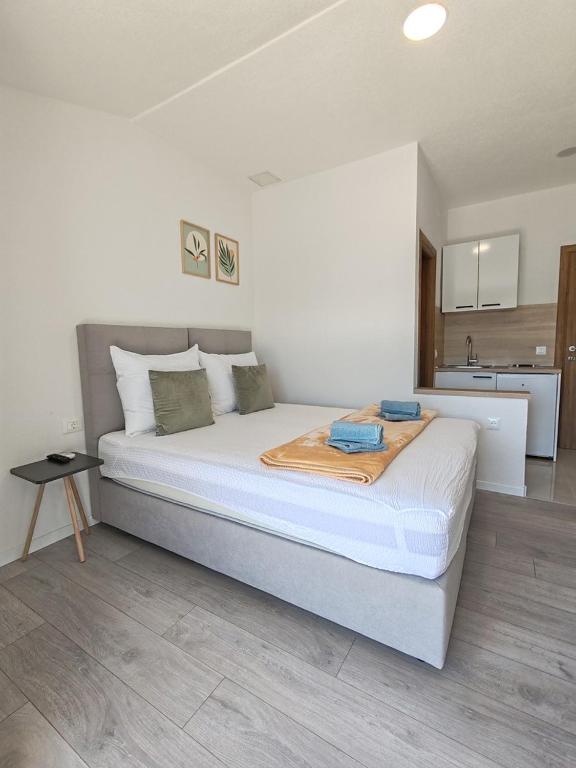 Postel nebo postele na pokoji v ubytování Apartments Kata