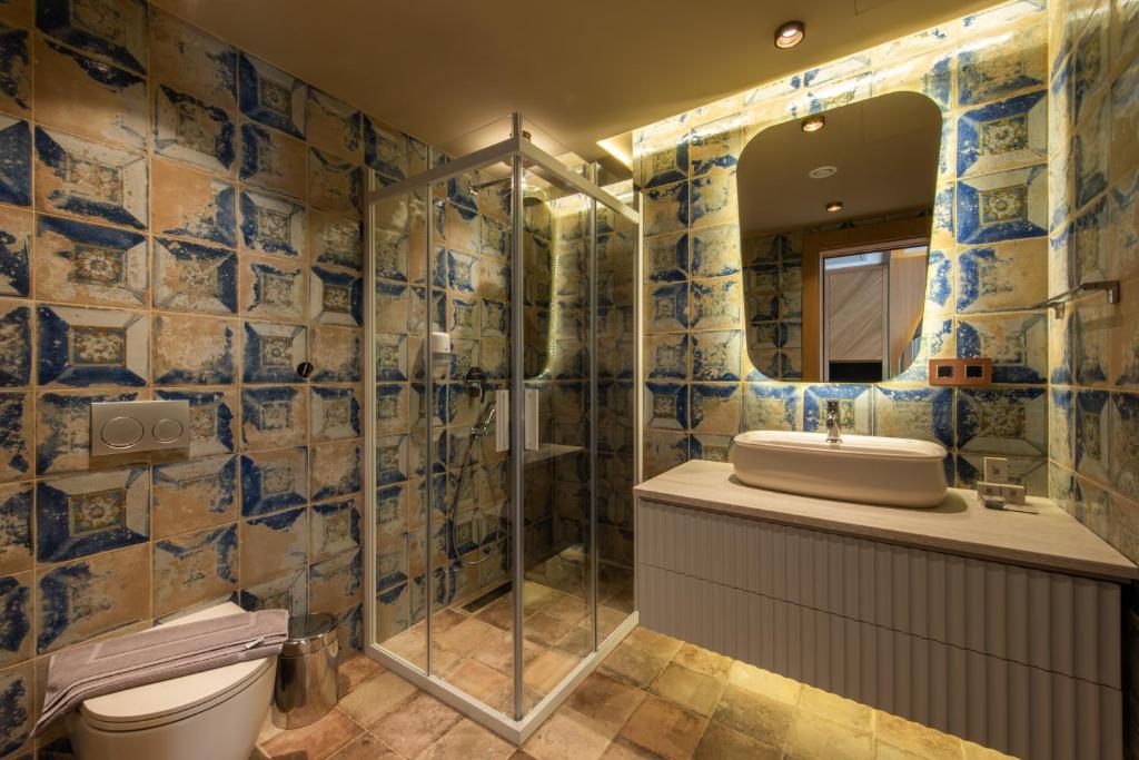 Koupelna v ubytování Casa Mimas Hotel