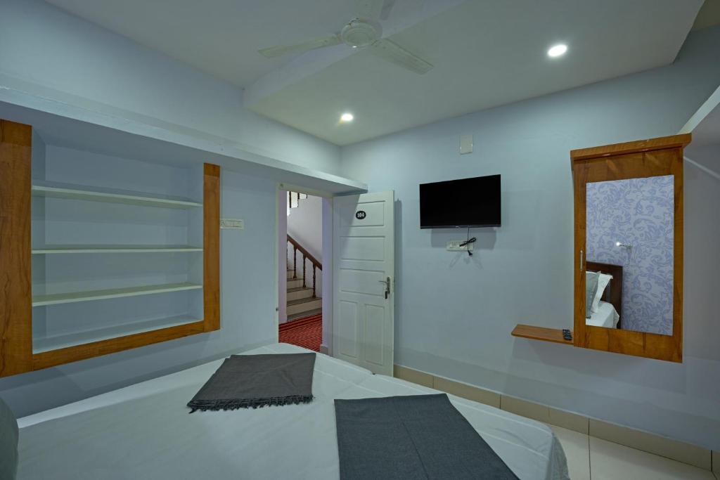 TV a/nebo společenská místnost v ubytování Panakal Residency, Fort Kochi