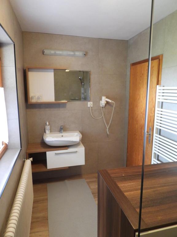 Kúpeľňa v ubytovaní Ferienhaus Oberlengau