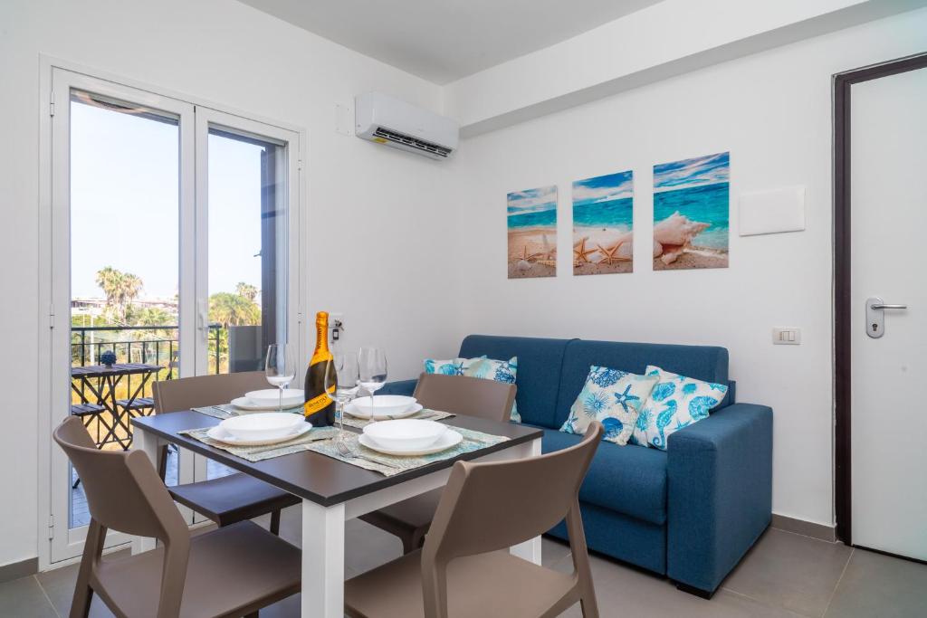 Posezení v ubytování Etnabeach Apartament - Fondachello