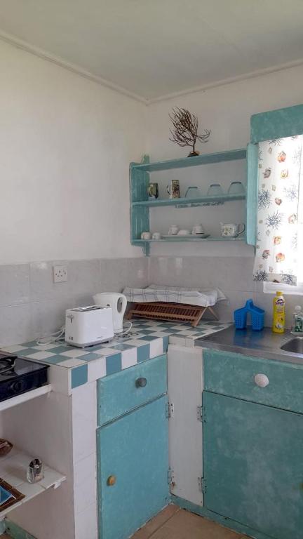 Kuchyň nebo kuchyňský kout v ubytování Maison Amantine
