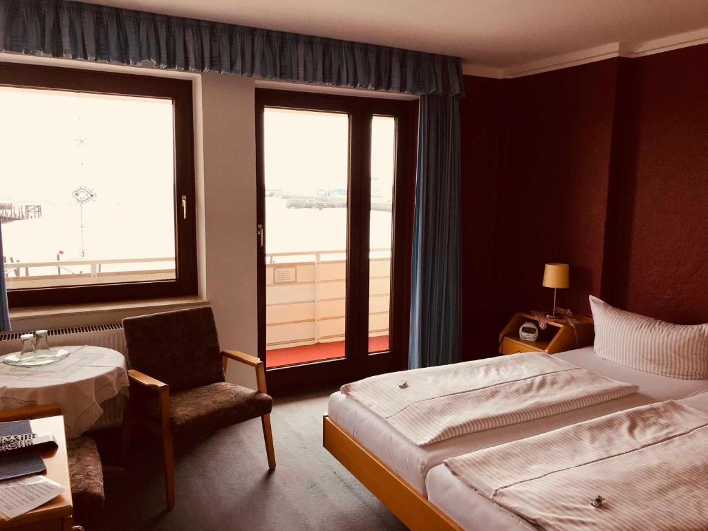 Postel nebo postele na pokoji v ubytování Haus am Meer, Hotel Garni