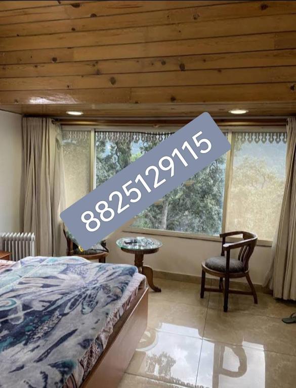 Postel nebo postele na pokoji v ubytování Hotel Nalanda Guest House