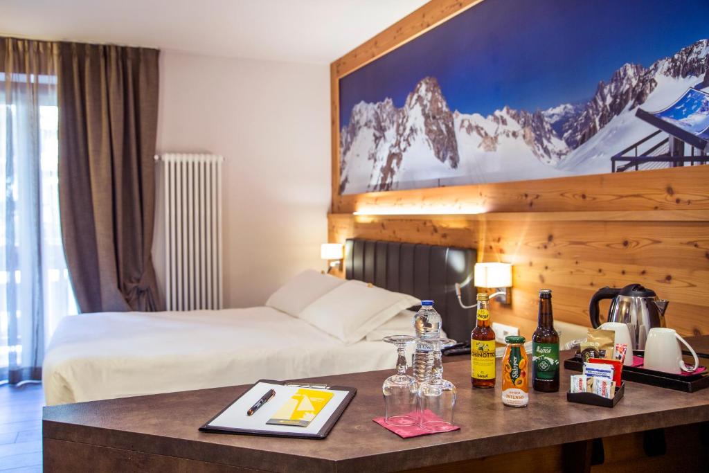 Postel nebo postele na pokoji v ubytování Dada Mountain Hotel