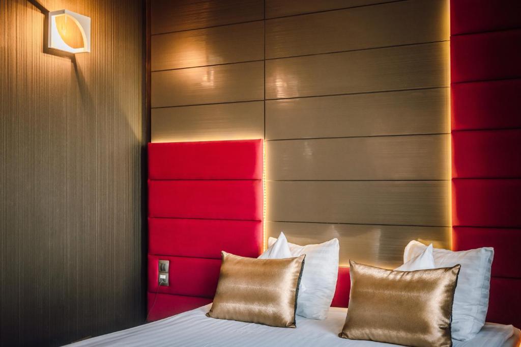 Postel nebo postele na pokoji v ubytování Plaza V Hotel