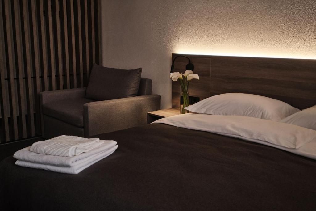 Postel nebo postele na pokoji v ubytování UNGVARSKIY Thermal Hotel