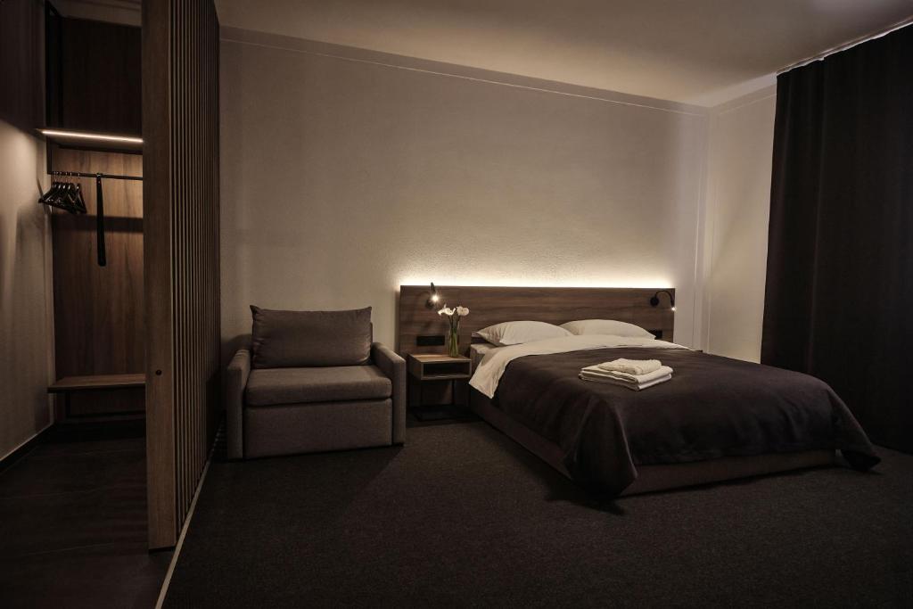 Postel nebo postele na pokoji v ubytování UNGVARSKIY Thermal Hotel