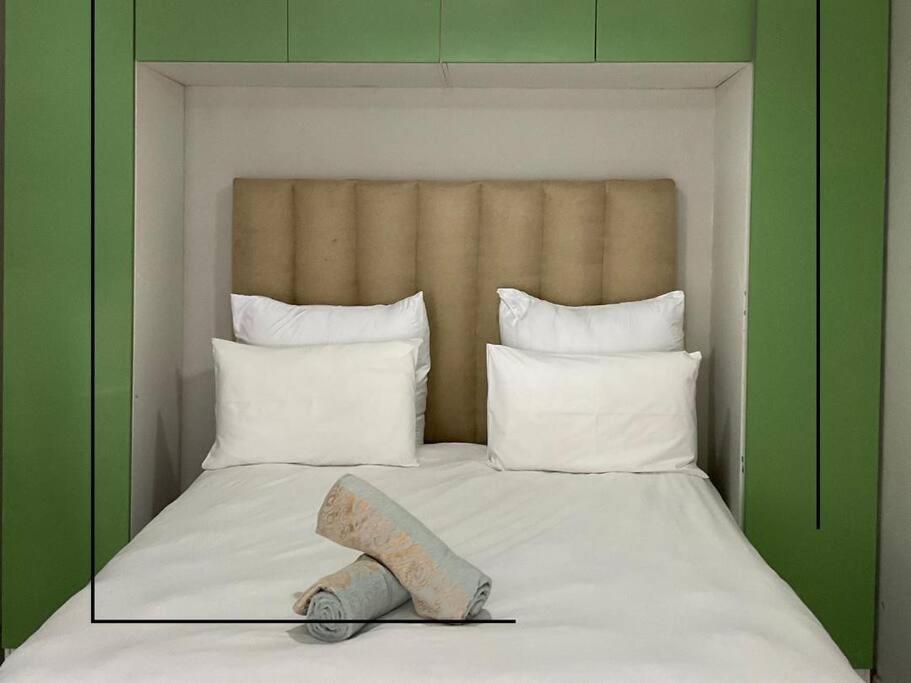 Llit o llits en una habitació de Studio Apartment - SLG Unit 12