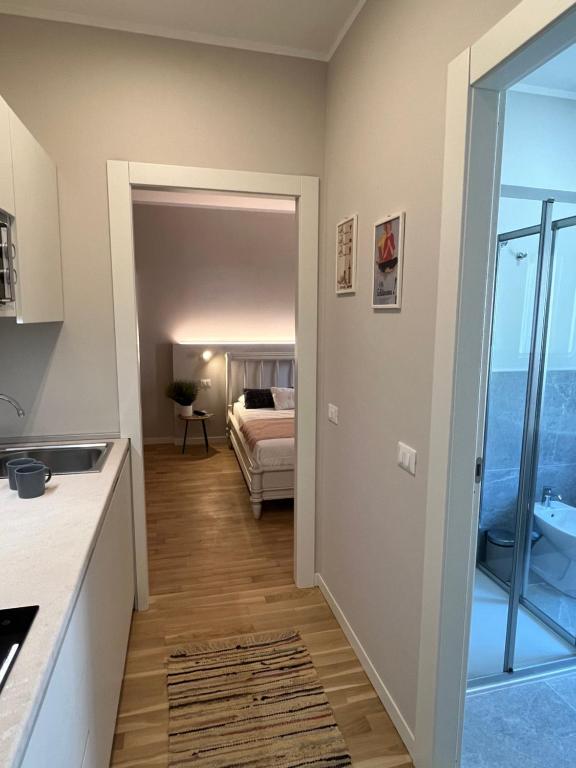 Postel nebo postele na pokoji v ubytování Garda Flow Holiday Home
