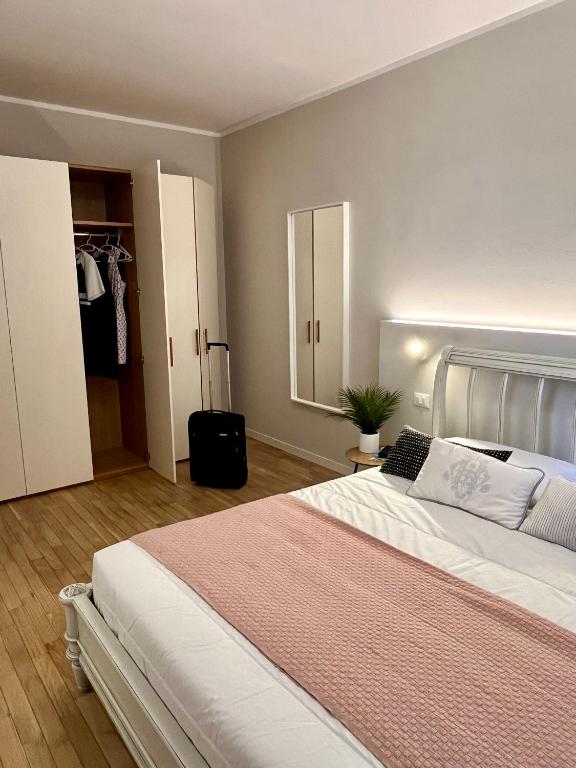 Postel nebo postele na pokoji v ubytování Garda Flow Holiday Home