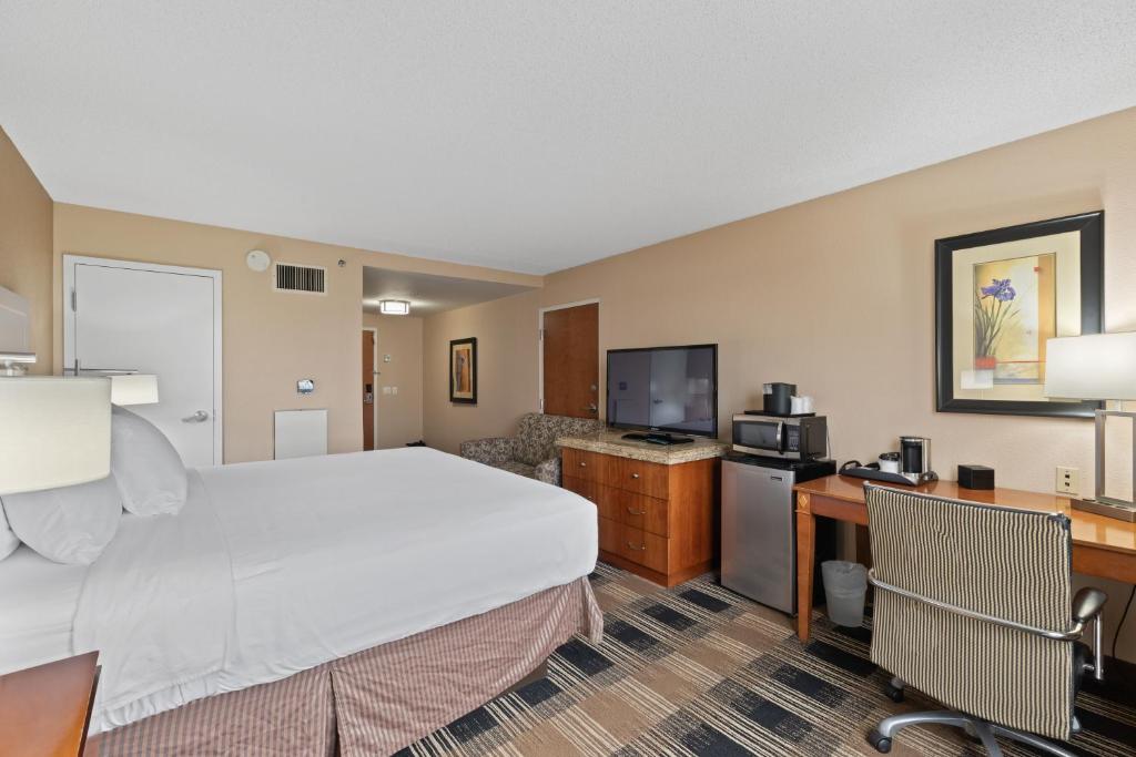TV a/nebo společenská místnost v ubytování Hotel Executive Suites