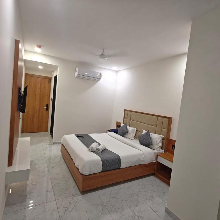Postel nebo postele na pokoji v ubytování Hotelmaple tree