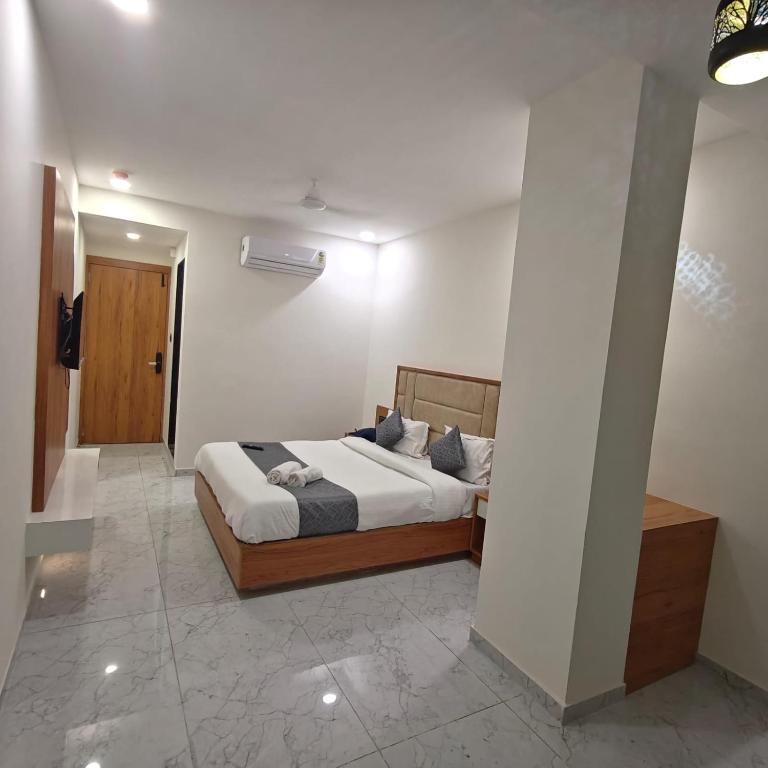 Postel nebo postele na pokoji v ubytování Hotelmaple tree