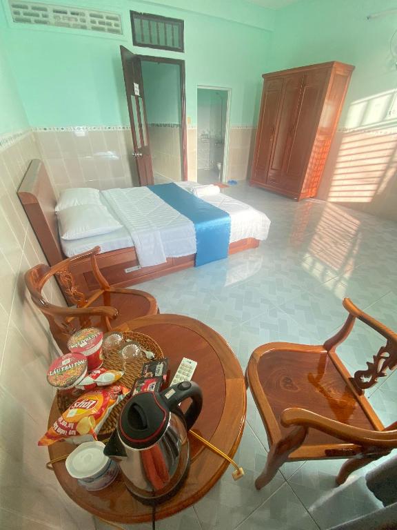 Postel nebo postele na pokoji v ubytování Phú Mỹ Port Motel