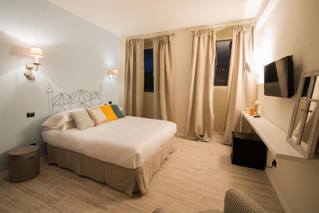 Letto o letti in una camera di So&Leo Guest House