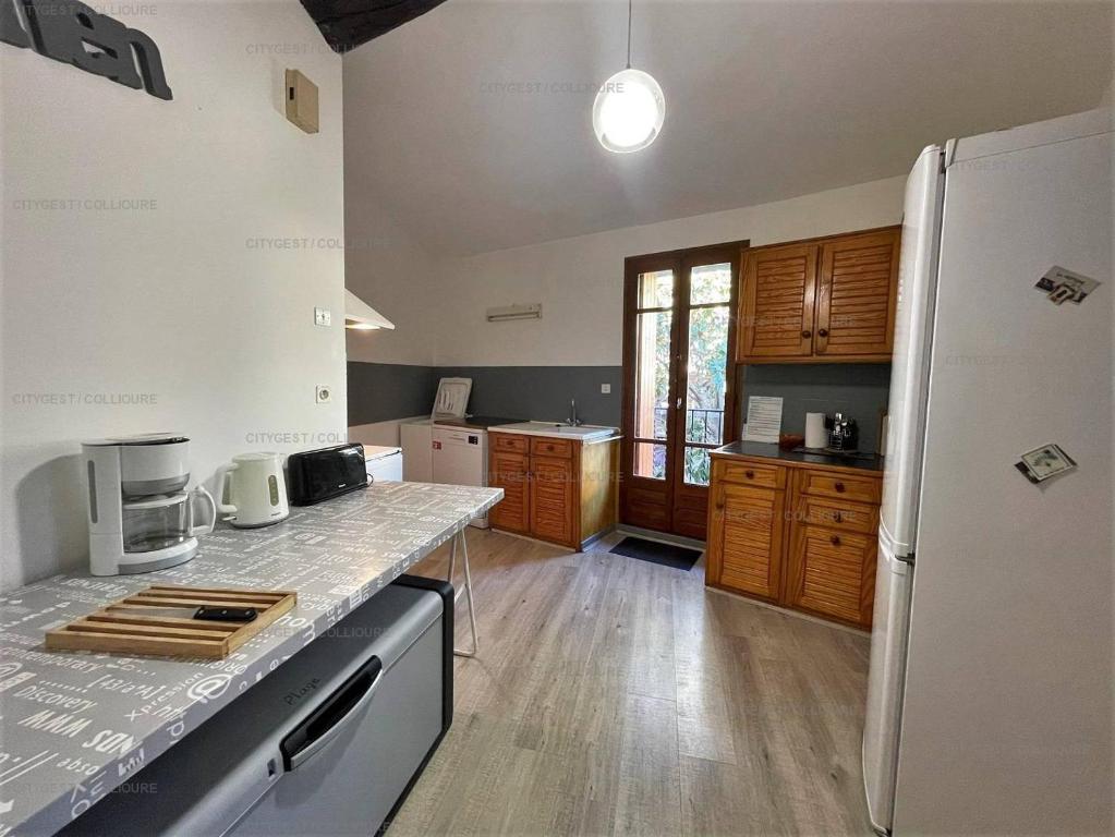 Kuchyňa alebo kuchynka v ubytovaní 6VOLT21 Appartement pour 6 personnes au cœur du Faubourg