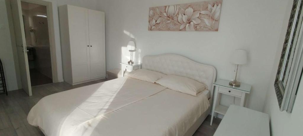 Postel nebo postele na pokoji v ubytování B&B Marijana