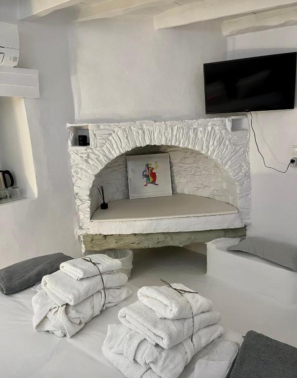 Posteľ alebo postele v izbe v ubytovaní SAO Smallport Naoussa Paros