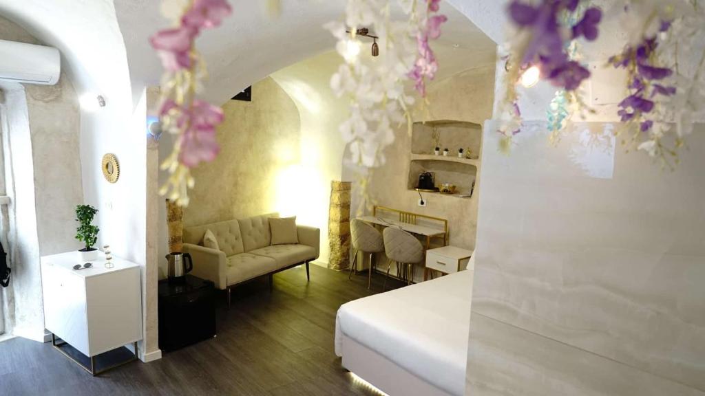 Postel nebo postele na pokoji v ubytování Luxy Gargano Suite