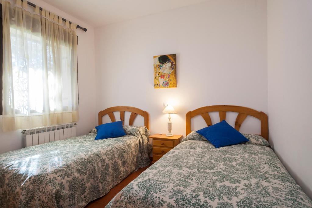 A bed or beds in a room at La Buenaventura del Tiétar