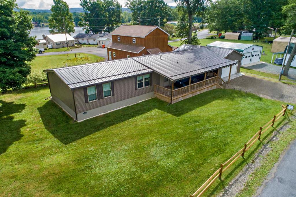 an overhead view of a house on a lawn at Weller Island Retreat in Hammondsport