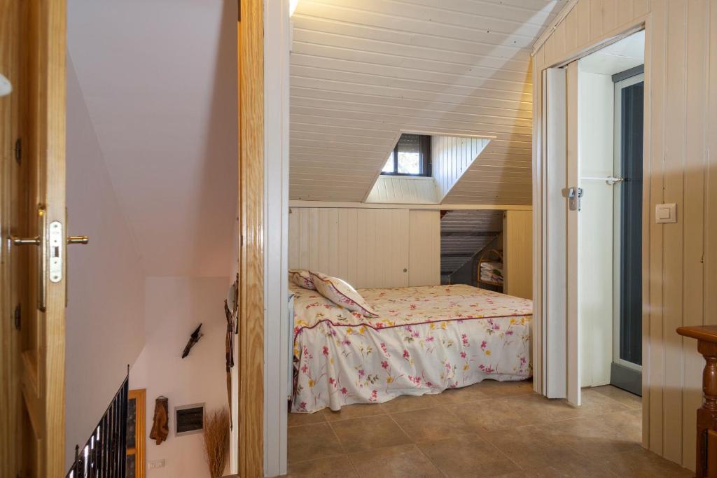 A bed or beds in a room at La Buenaventura del Tiétar