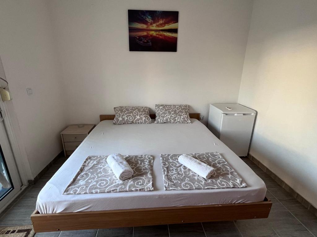 Postel nebo postele na pokoji v ubytování Saraj appartments