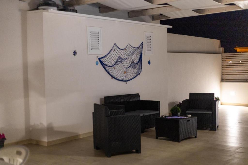 Posezení v ubytování Pietre Azzurre Rooms