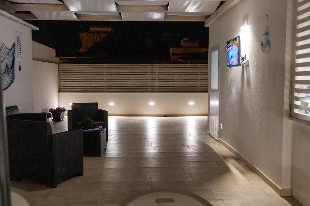 TV a/nebo společenská místnost v ubytování Pietre Azzurre Rooms
