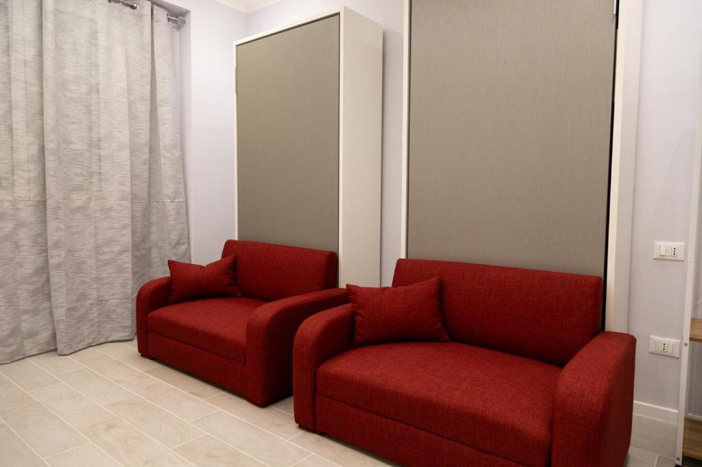 Posezení v ubytování Pietre Azzurre Rooms