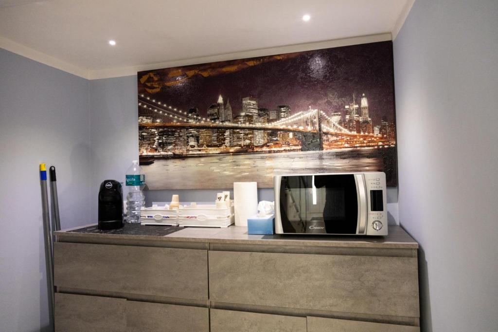 Kuchyň nebo kuchyňský kout v ubytování Pietre Azzurre Rooms