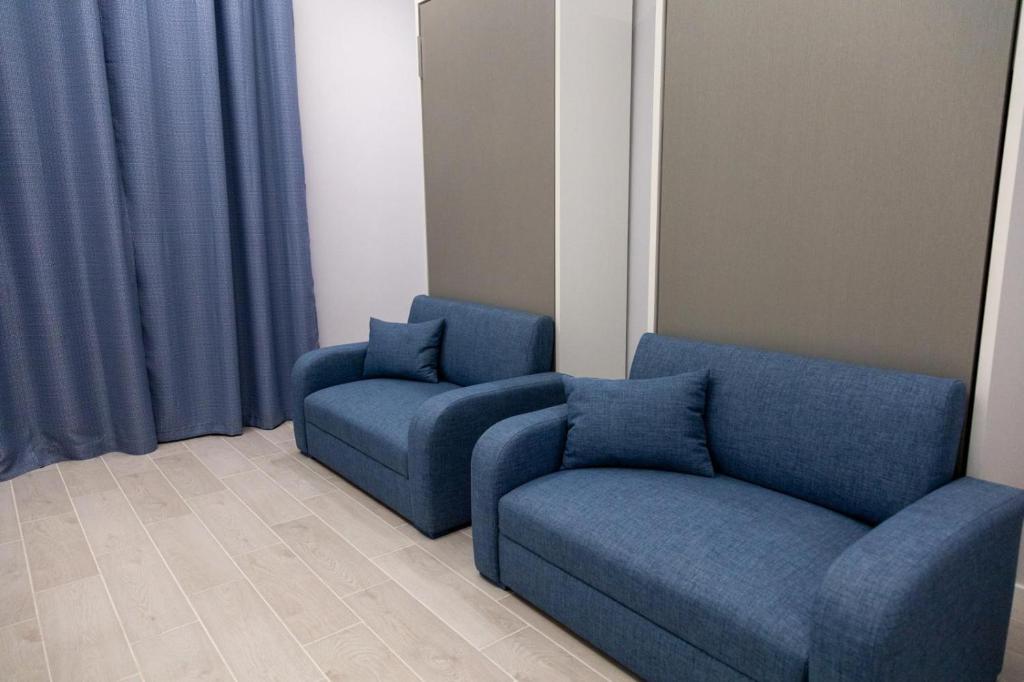 Posezení v ubytování Pietre Azzurre Rooms